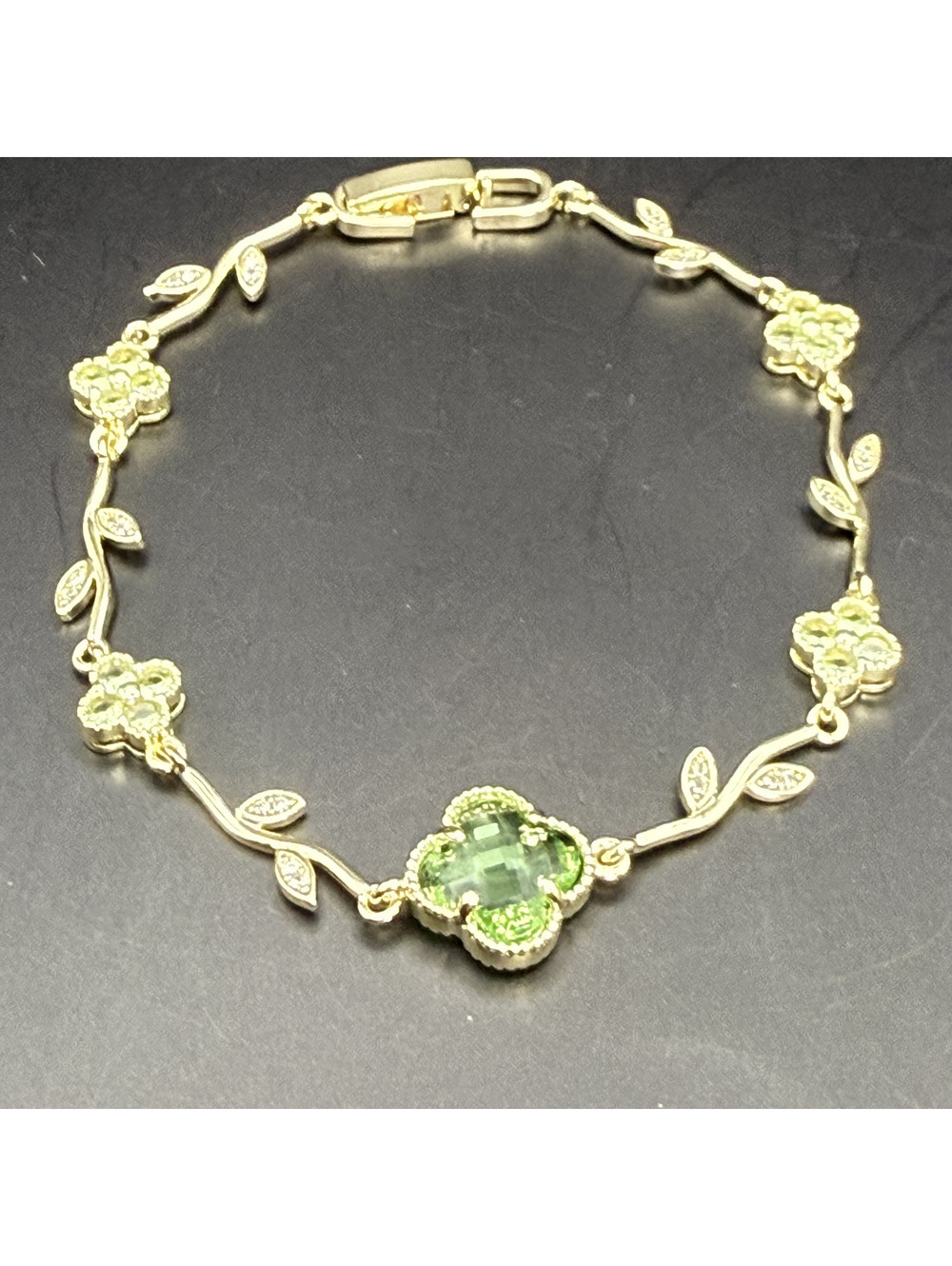 candy+clover light green peridot clover crystal vine gold tone bracelet